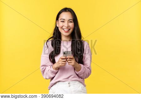 People Emotions, Lifestyle Leisure And Beauty Concept. Happy And Surprised Pretty Korean Girl In Sty