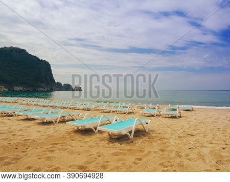Empty Sunbeds At Kleopatra Beach In Alanya