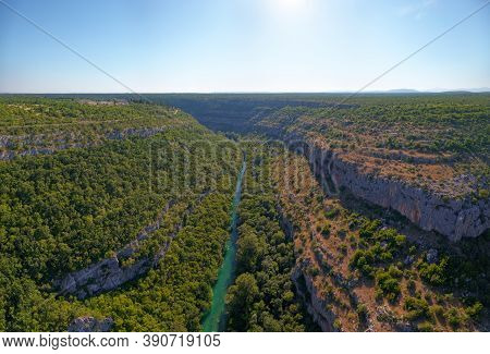 Krka River, Aerial View From The Middle Of The Canyon Located In Promina County At Dalmatian Zagora 