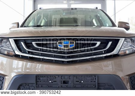 Russia, Izhevsk - August 14, 2020: New Modern Emgrand X7 In The Geely Showroom. Front View. Car Manu