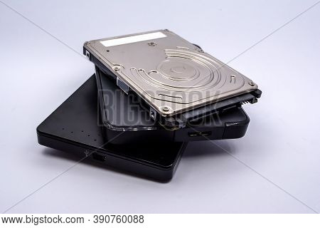 Hdd - Stack Of External And Internal Laptop Hard Disk Drives Isolated On White Background. Pile Of L