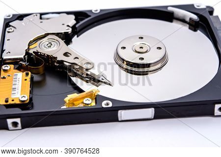 Internal Parts Of A Hard Disk Isolated On A White Background. Close Up Of Hard Disk Drive Inside Vie