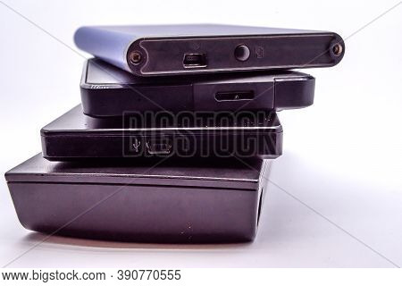 Hdd - Stack Of Portable Hard Disk Drives Isolated On White Background. Pile Of External Hard Disk Dr