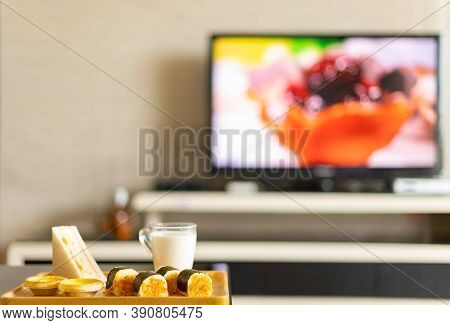 Healthy Breakfast In A Living Room With A Tv Broadcasting A Food Programme
