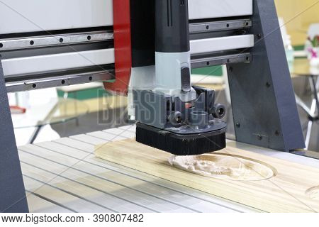 Milling A Wooden Board. Processing Of Wood Panels On Cnc Coordinate Milling Woodworking Machines. Cn