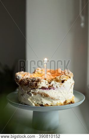 Polish Carpathian Mountain Cream Cake With Birthdate Candle On Blue Ceramic Cake Stand. Homemade Kar