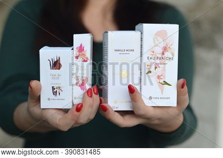 Young Girl Holds Yves Rocher Production In Packages. Yves Rocher Is A Worldwide Cosmetics And Beauty