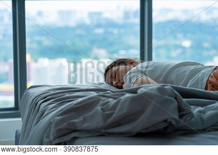The Girl Accidentally Fell Asleep In Bed At Noon. The Girl Sleeps In The Afternoon In Clothes. Short