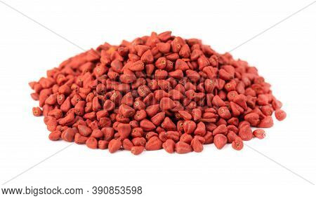Annatto Seeds, Isolated On White Background. Achiote Seeds, Bixa Orellana. Natural Dye For Cooking A
