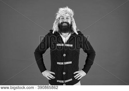 Good Time. Male Fashion. Smiling Trendy Hipster. Beard Care In Cold Season. Brutal Man Earflap Hat. 