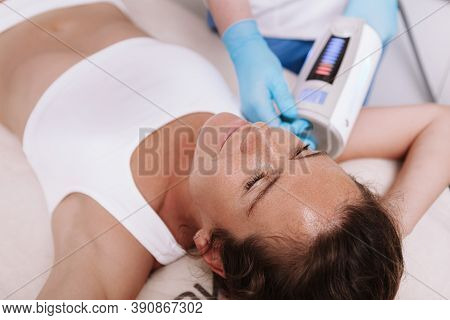 Top View Cropped Shot Of A Mature Woman Getting Endospheres Therapy, Beautician Massaging Her Arm