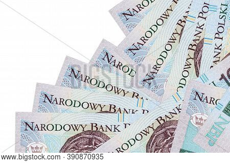 10 Polish Zloty Bills Lies In Different Order Isolated On White. Local Banking Or Money Making Conce