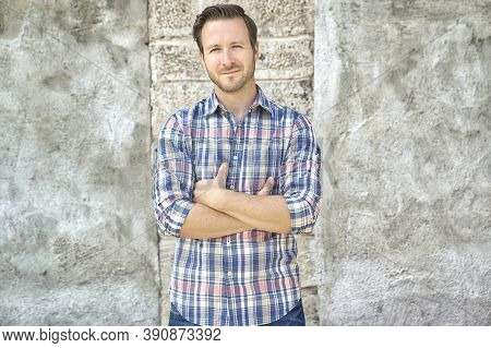 Portrait Of A Trendy Young Man In The City Concreate Background