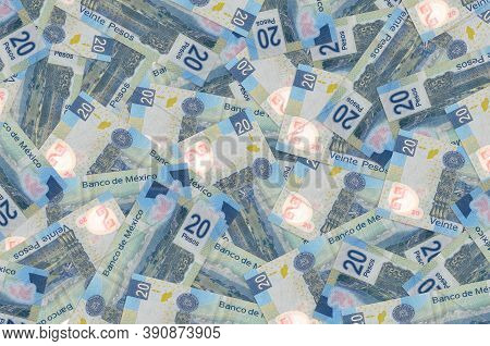 20 Mexican Pesos Bills Lies In Big Pile. Rich Life Conceptual Background