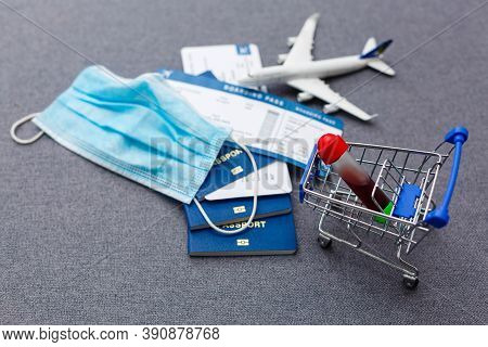 Coronavirus And Travel Concept. The Concept Of Restrictions For Tourism. Passport, Thermomether And 