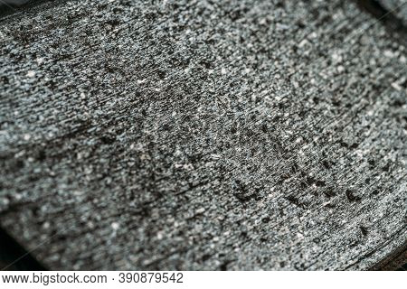 Worn Car Brake Pad Surface As Abstract Grey Scratched Background.