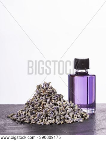 Lavender Essential Oil Glass Bottle With Dried Lavender Flowers - Lavandula