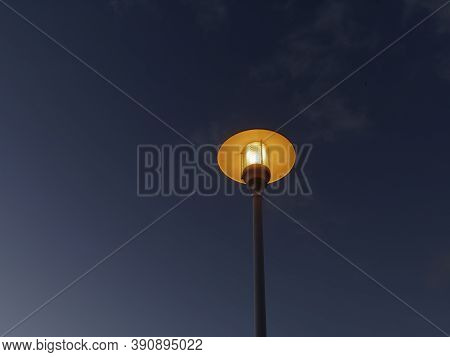 View Of Lamppost On The Pedregalejo Beach At Dusk