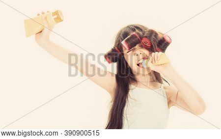 Little Girl Is Holding A Tube For The Cream. Cute Teen Putting Cream On Her Face. Little Girl In Hai