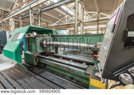 Cnc Machine And Control Panel At A Machine-building Enterprise.