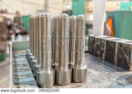 Bolts, Screws And Threaded Rods After Turning On A Rack.