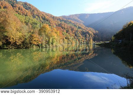 Autumn landscape with lake on Tereblya mountain river in ukrainian Carpathians
