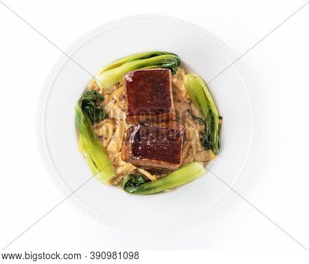 Isolated Dong Po Rou (dongpo Pork Meat) In A Beautiful Plate With Green Vegetable.