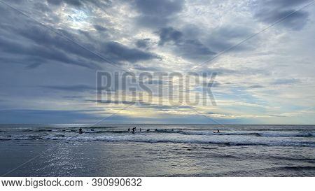 Kamchatka Peninsula, Russia - September 9, 2020: A Group Of Surfers Is Learning To Ride The Small Wa