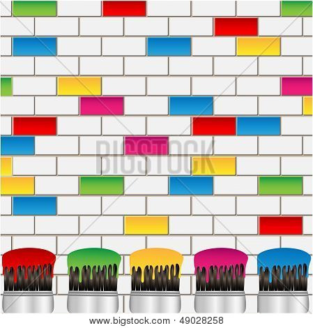 white and coloured bricks and brushes with a paint