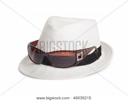 Sunglasses And A White Summer Hat On An Isolated Background