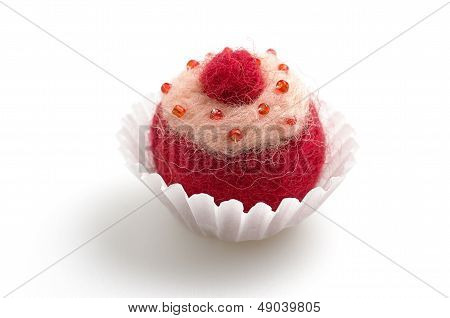 colorful felt praline on a white background
