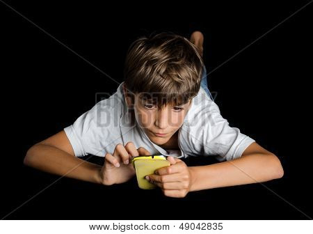 Child Typing On Cell Phone