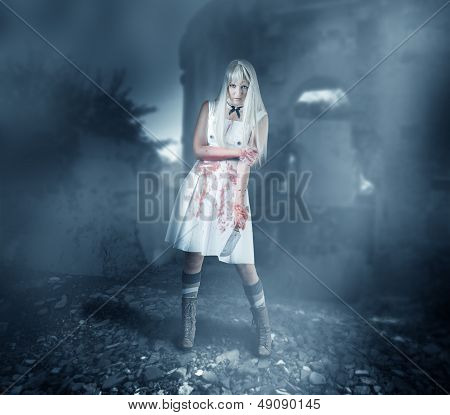 Sexy Woman Zombie Stands In Ruins