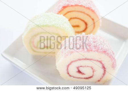 Colorful Jam Roll Cakes  On White Background