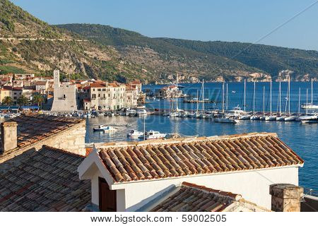 KOMIZA, CROATIA - AUGUST 19, 2012:  Yachts and boats in the harbour of Komiza on the island of Vis in Croatia.
