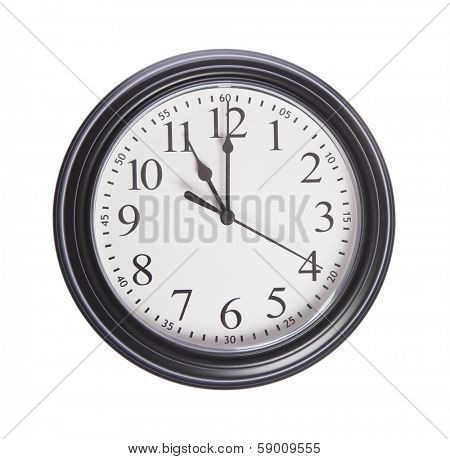 Wall clock shows time 11 o'clock on white isolated background
