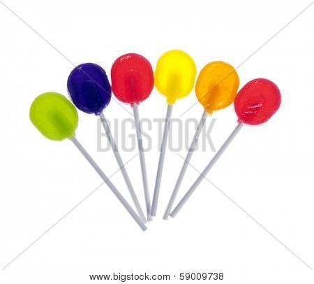 Six lollipops isolated on white background.