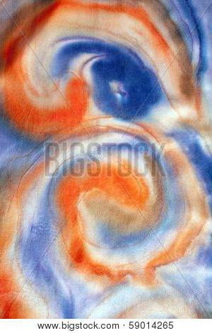 Close up view of silk scarf with abstract pattern
