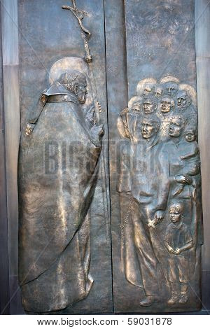 Cracow Lagiewniki - The centre of Pope John Paul II. Door from bronze to the church