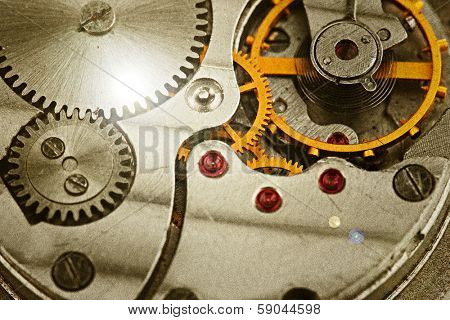 Clockwork details, pinions and wheels closeup