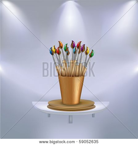 Paint brushes on a shelf