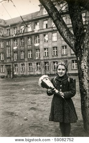 GERMANY, CIRCA FIFTIES - Vintage photo of little girl with 