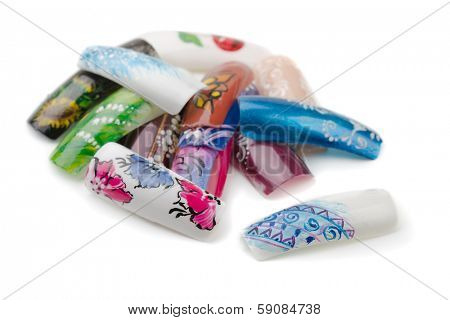 Pile of artificial nails isolated on white