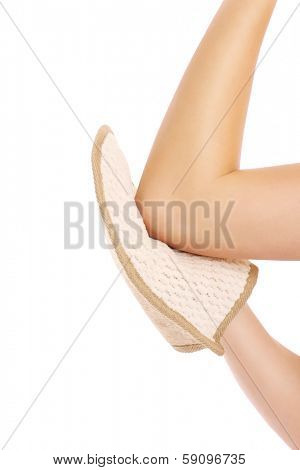 A picture of a woman doing peeling with a glove over white background