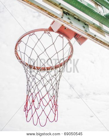 Red Basketball Hoop And White Cloud