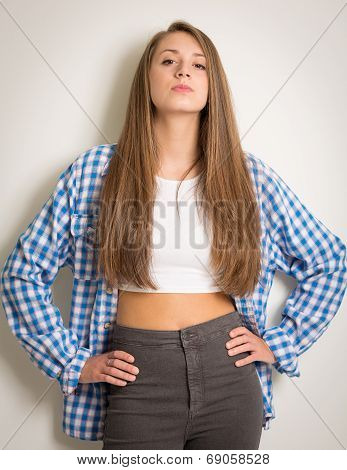 Beautiful Teen Girl In A White Top And Blue Shirt