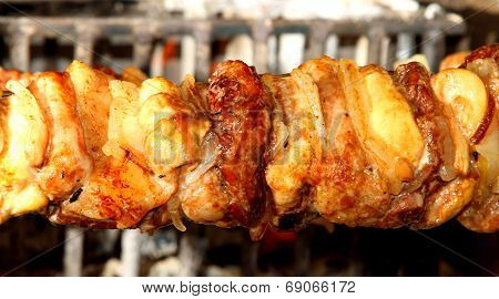 Meat Cooked In The Fireplace With Chicken And Bacon 8
