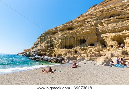 Pebbly Beach Matala, Greece Crete. Matala Has Become Famous For Artificial  Neolithic Caves, Carved