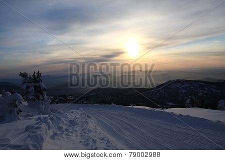 Sunset is in mountains.