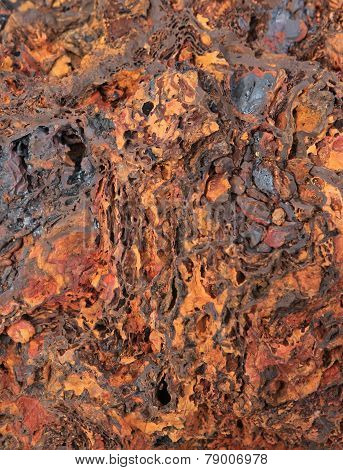 Red stone background close up